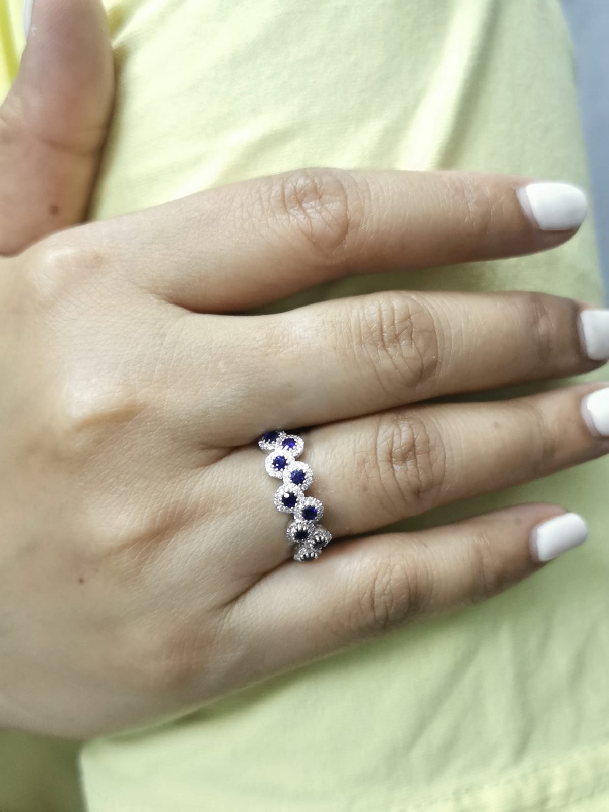 Sapphire and diamond halo ring in 18K gold