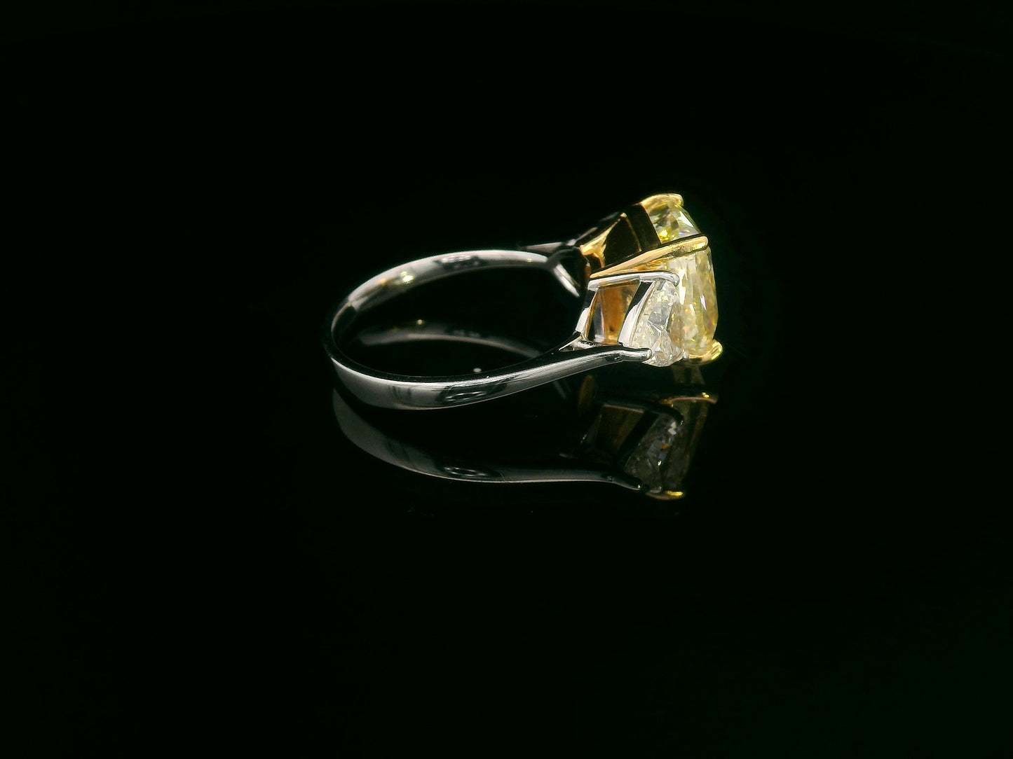luxury engagement ring with 5.86ct cushion yellow diamond