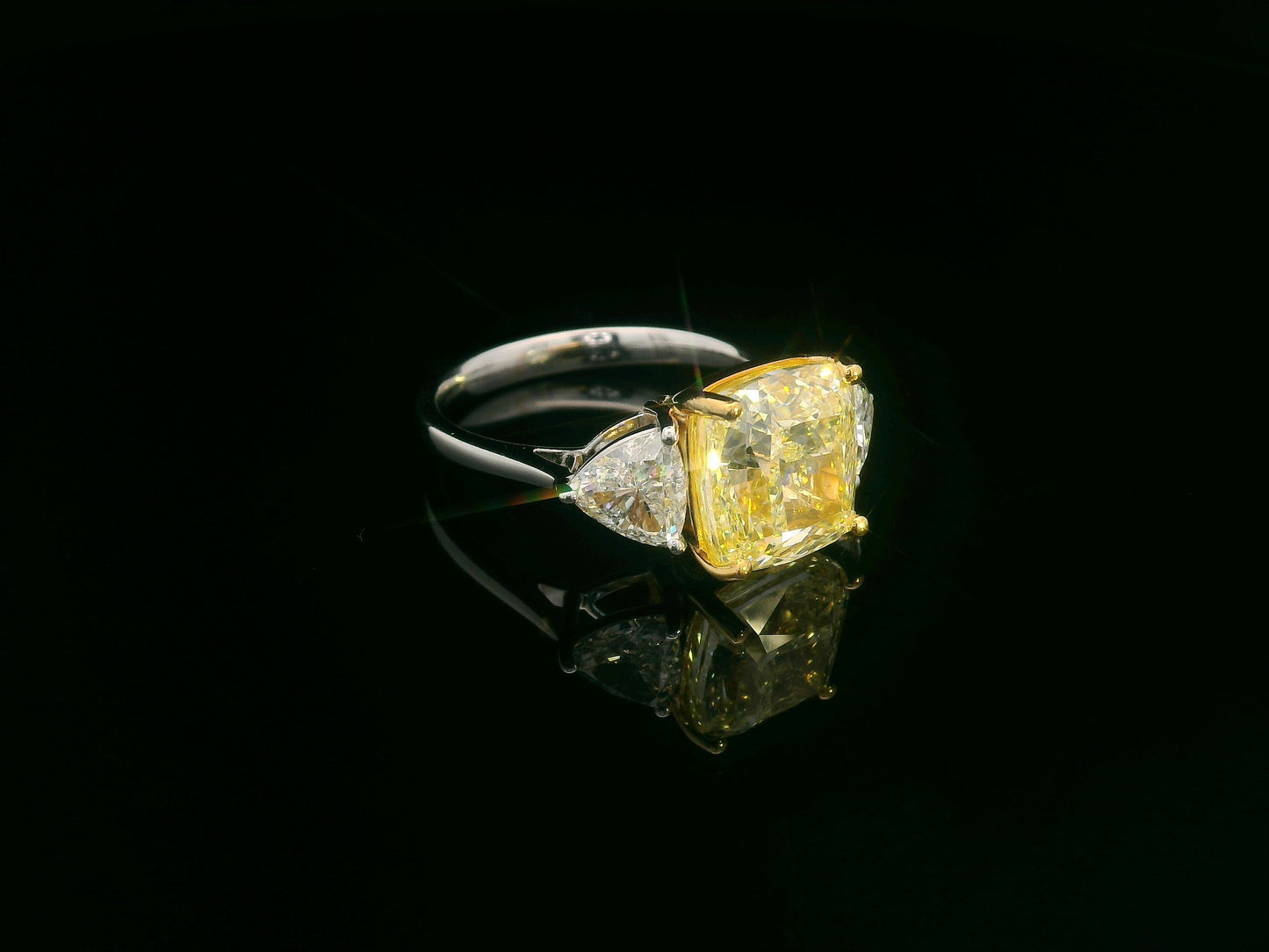 luxury engagement ring with 5.86ct cushion yellow diamond