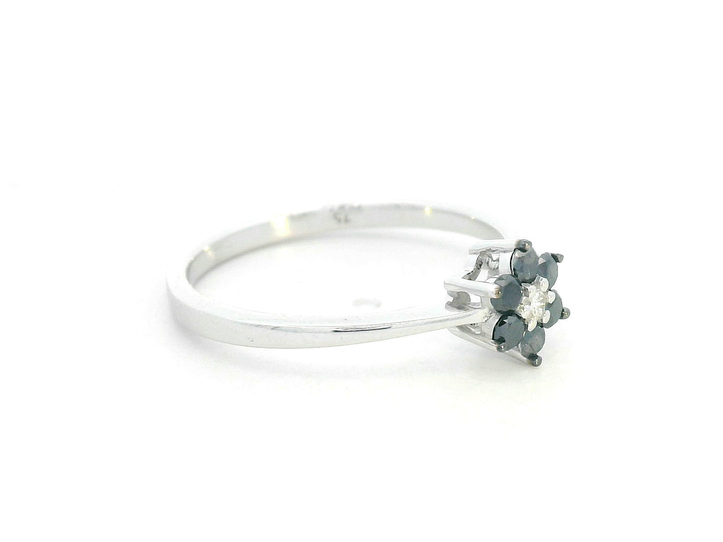 Black diamond flower ring with a white diamond center