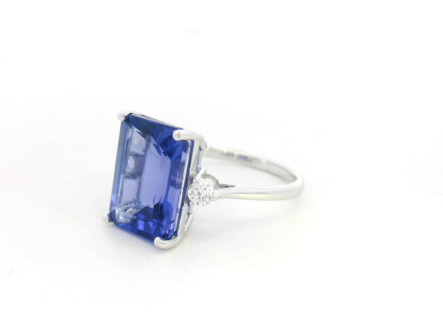 8.04 Carat Emerald-Cut Tanzanite Ring with Diamond Accents in 18K Gold