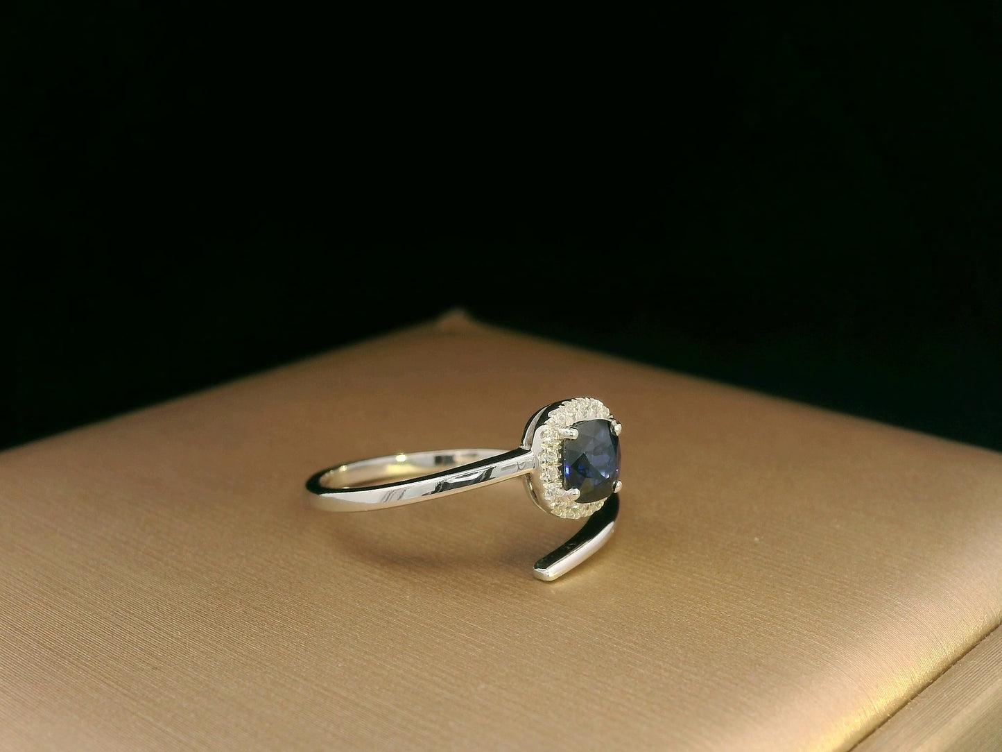 18K White Gold Blue Sapphire and Diamond Halo Bypass Ring – 0.59ct Sapphire
