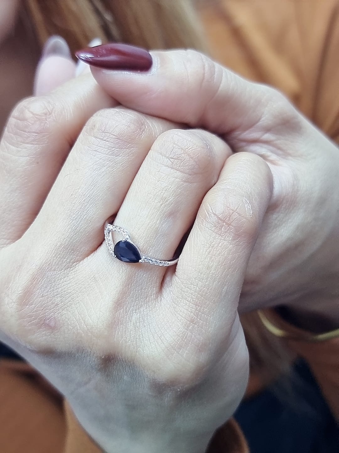 18K white gold asymmetrical ring with 0.78 carat pear-shaped blue sapphire and pavé diamonds, elegant contemporary design