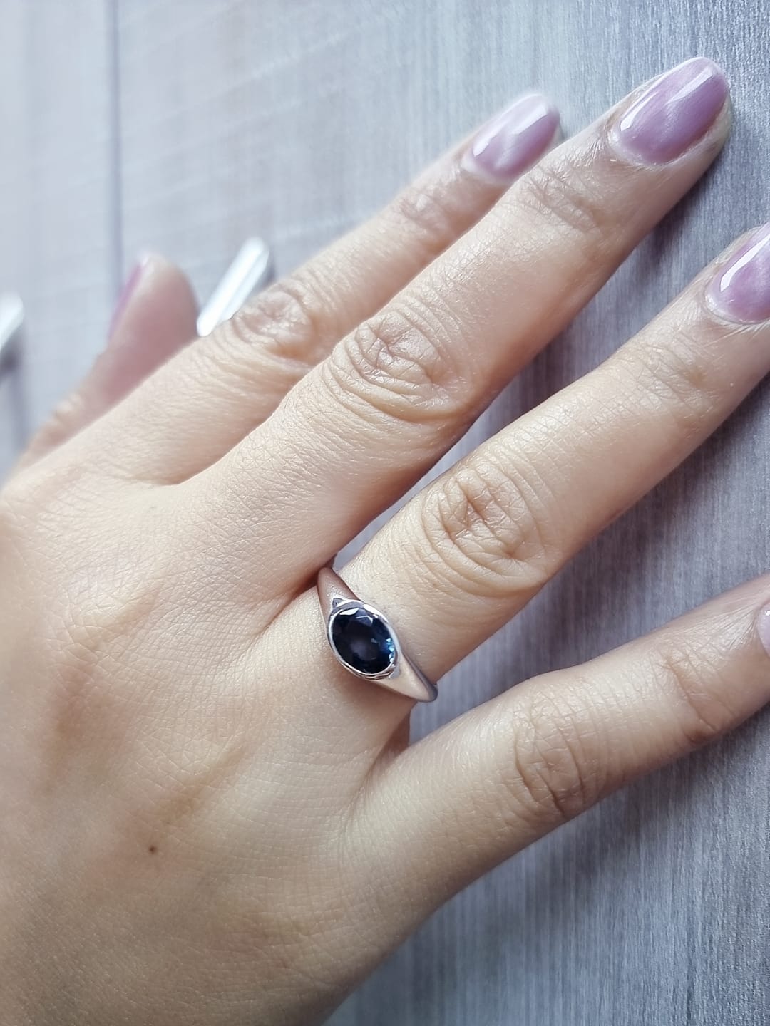 Unisex 18K gold London Blue Topaz bezel ring with minimalist tapered band