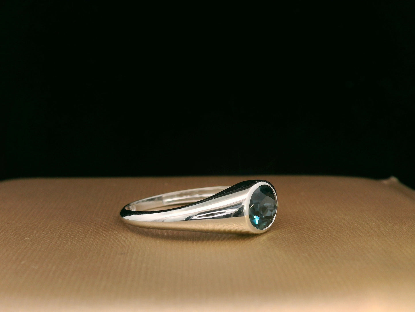 Unisex 18K gold London Blue Topaz bezel ring with minimalist tapered band