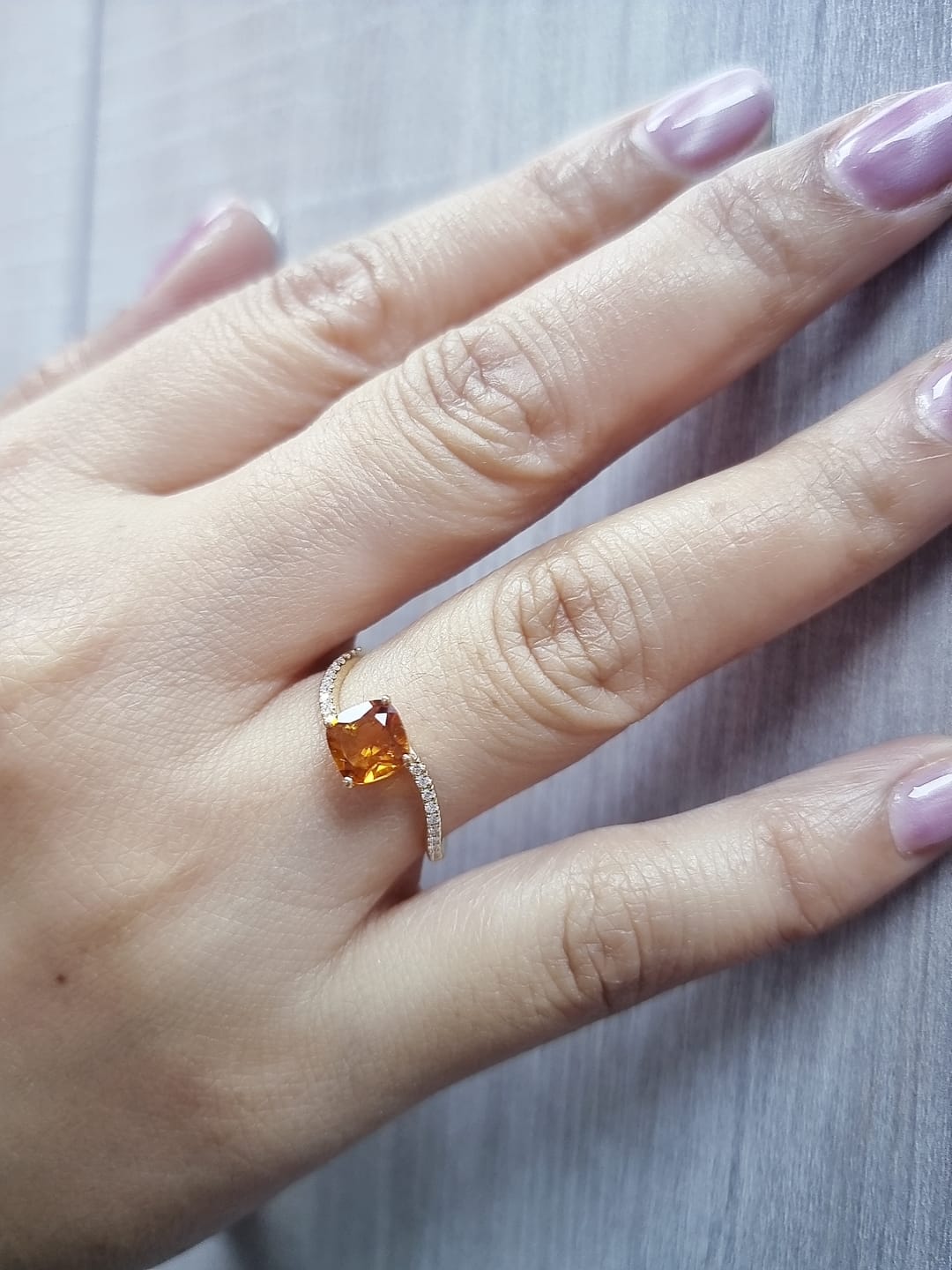 18K gold ring with 0.91 carat cushion-cut citrine and 0.11 carat diamond ribbon, modern luxury design