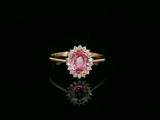18K rose gold oval pink sapphire and diamond halo ring – fine jewelry by Emirates Diamonds.