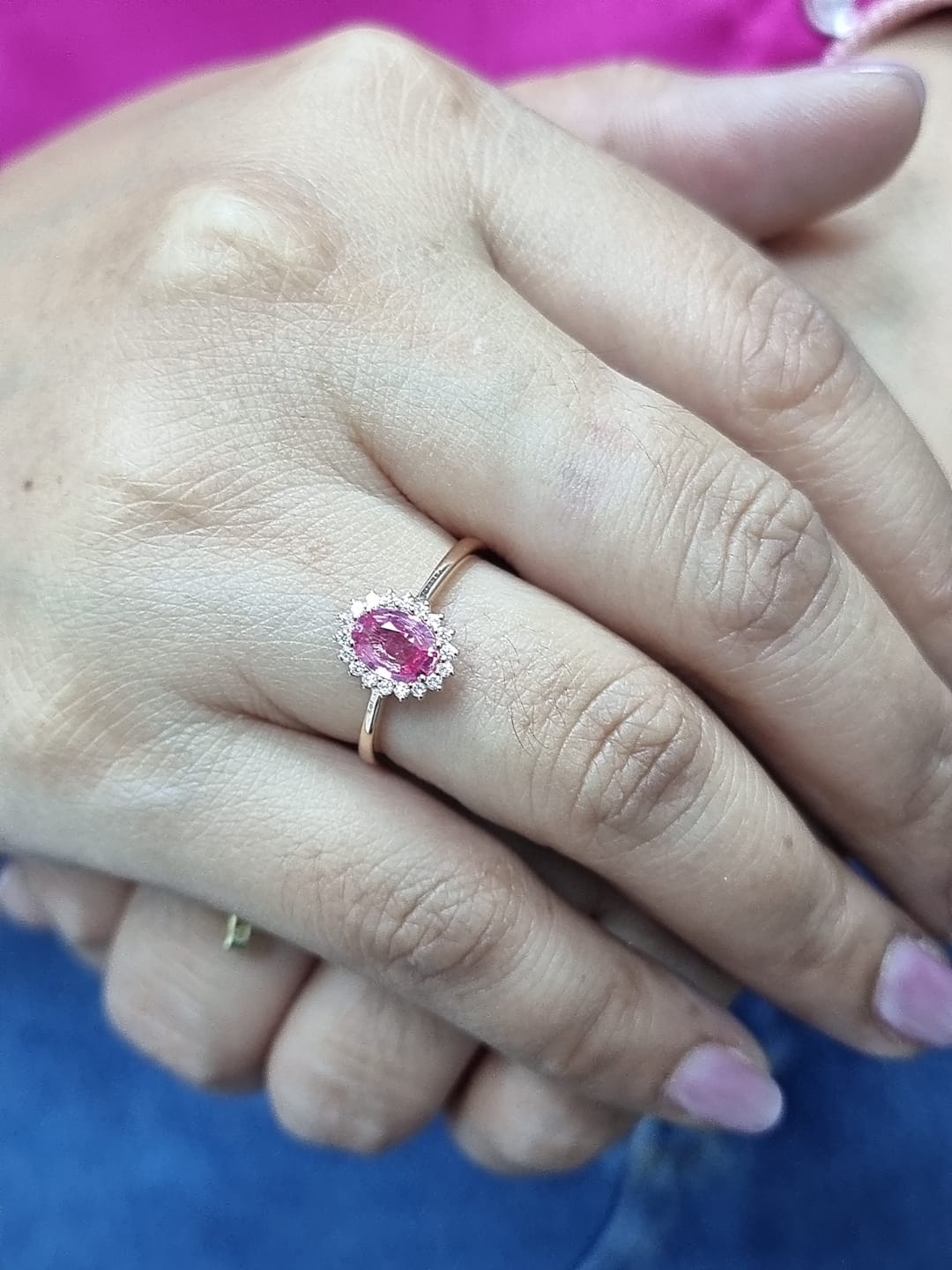 18K rose gold oval pink sapphire and diamond halo ring – fine jewelry by Emirates Diamonds.