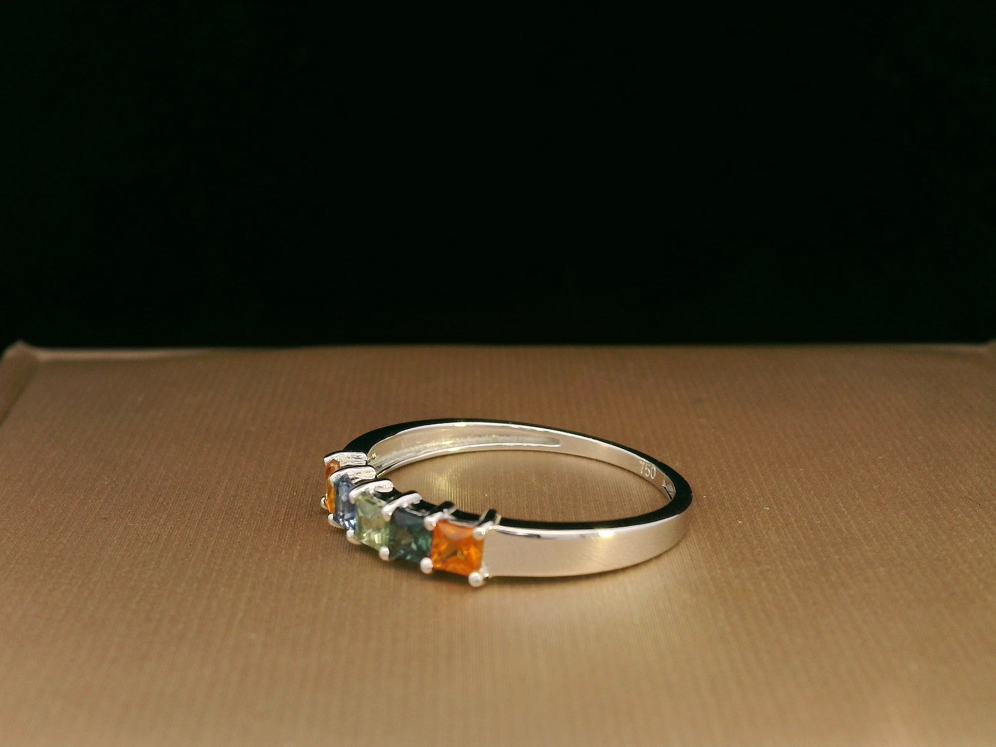 Multi-colored princess-cut sapphire ring in 18K white gold