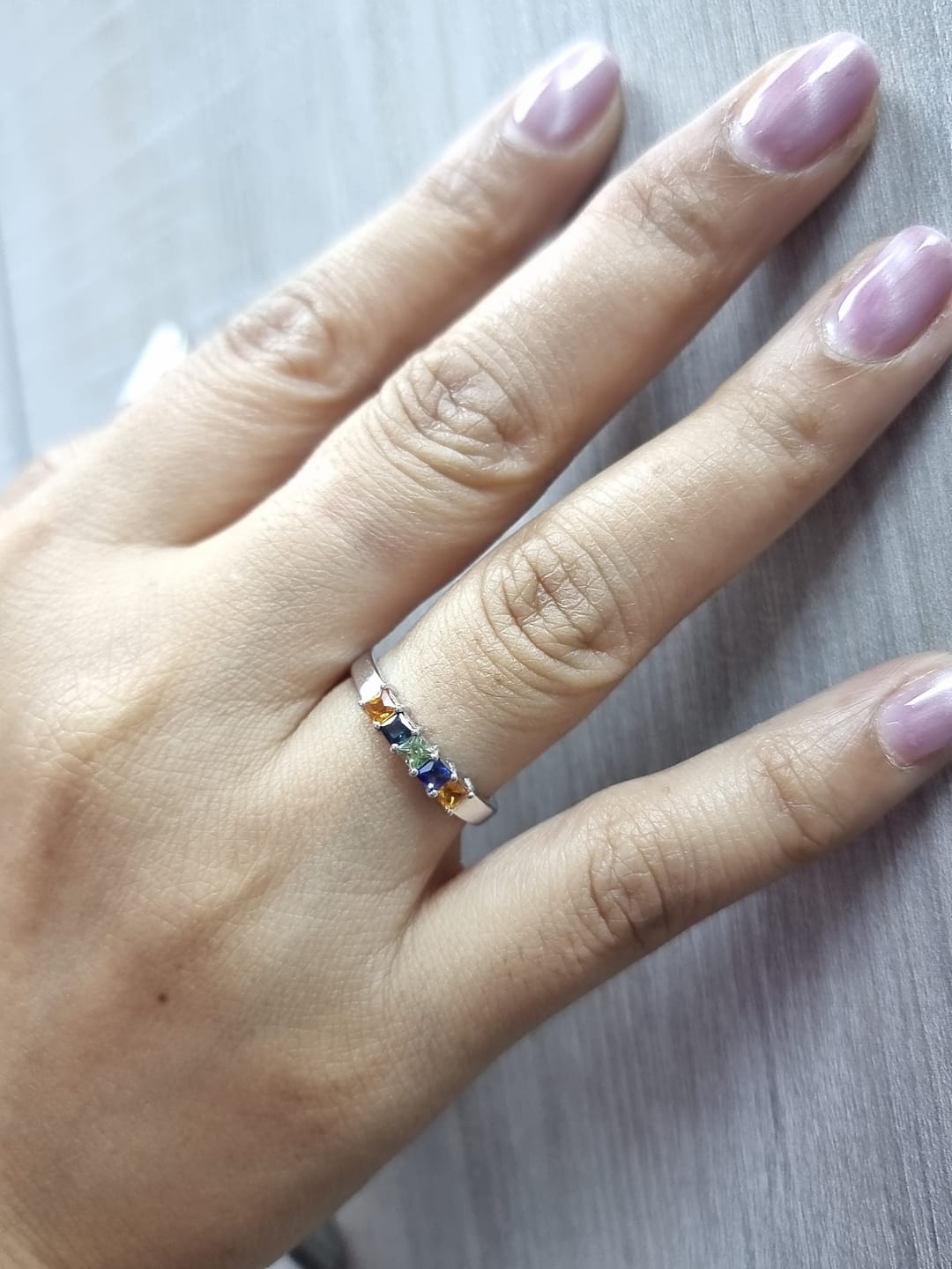 Multi-colored princess-cut sapphire ring in 18K white gold