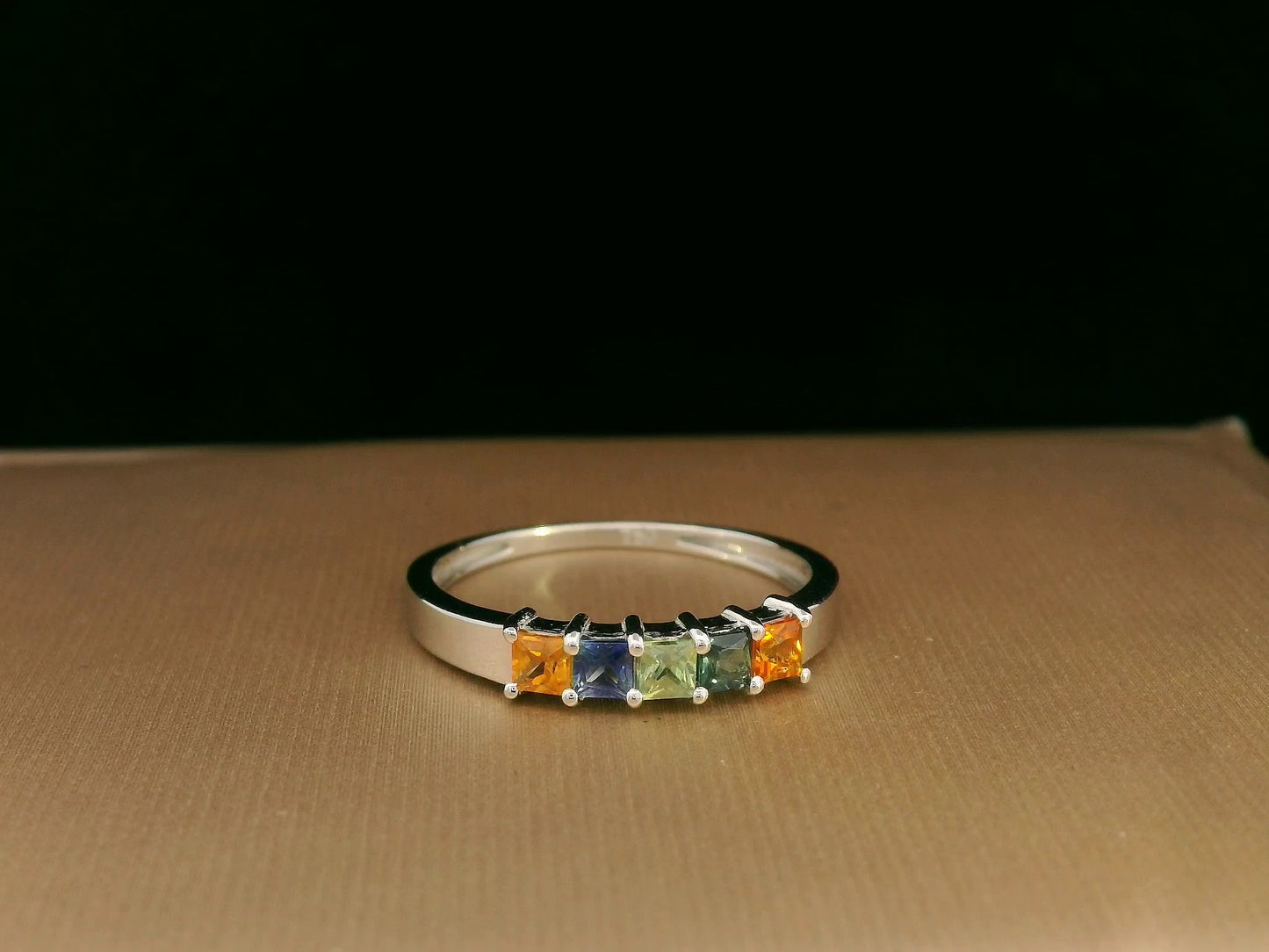 Multi-colored princess-cut sapphire ring in 18K white gold