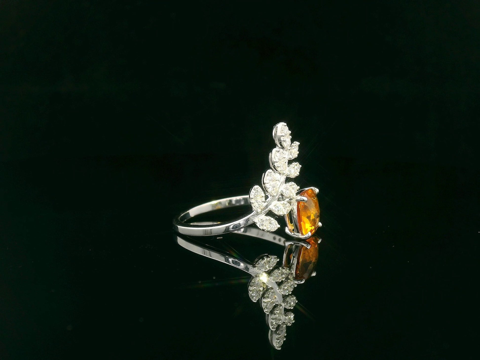 Cushion-cut citrine ring with marquise diamond leaf motif in 18K white gold