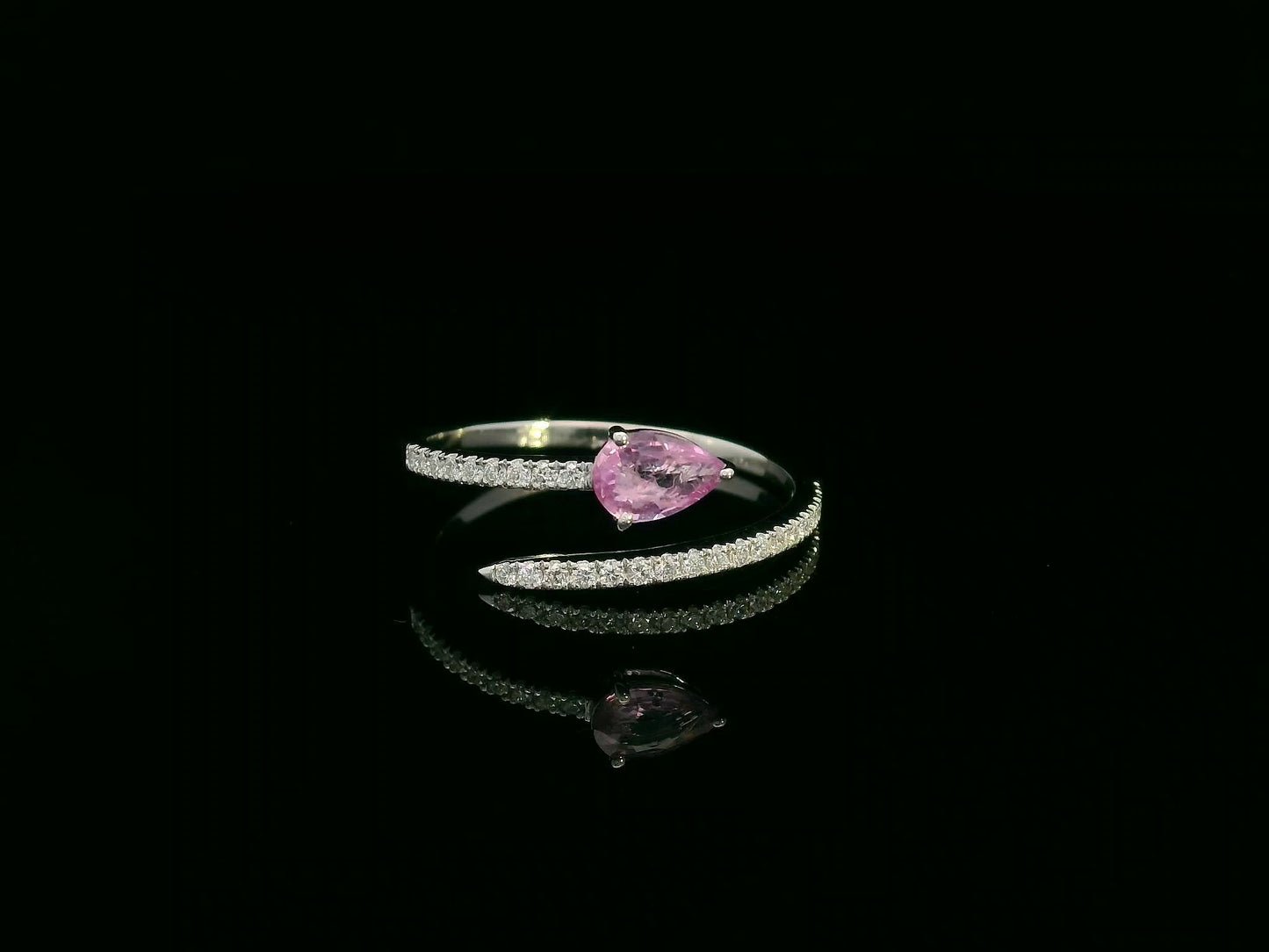 18K white gold open bypass ring with 0.39ct pear pink sapphire and 0.16ct pavé diamonds