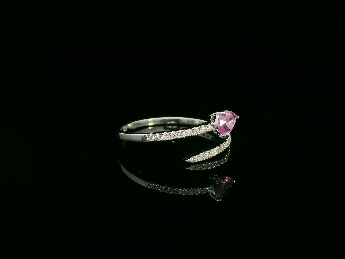 18K white gold open bypass ring with 0.39ct pear pink sapphire and 0.16ct pavé diamonds