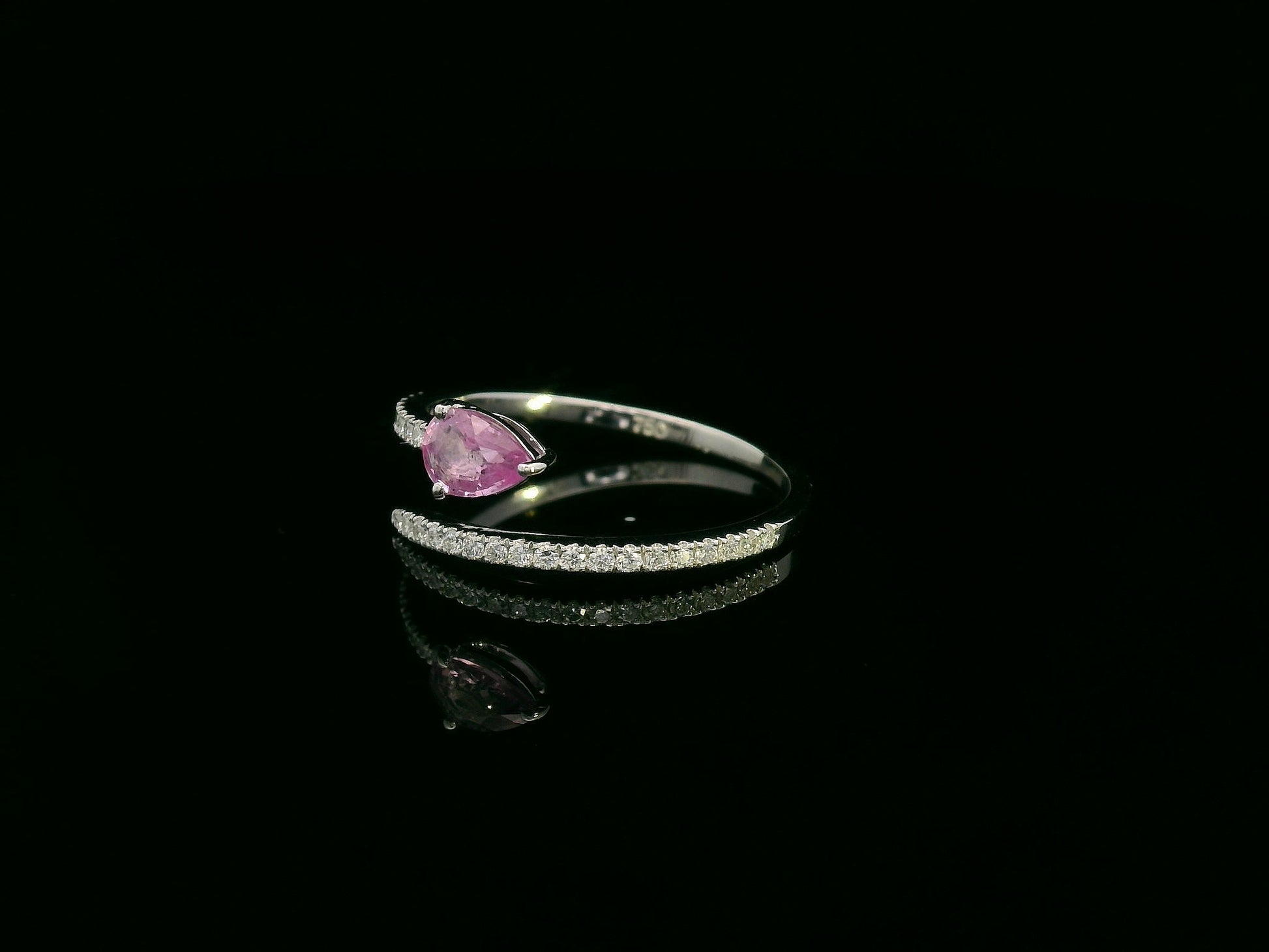 18K white gold open bypass ring with 0.39ct pear pink sapphire and 0.16ct pavé diamonds