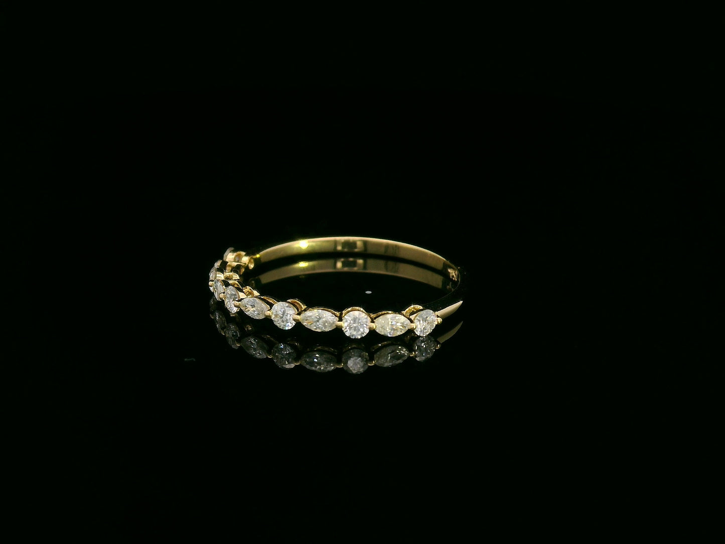 18K yellow gold diamond band featuring alternating marquise and round diamonds – elegant stackable fine jewelry by Emirates Diamonds.