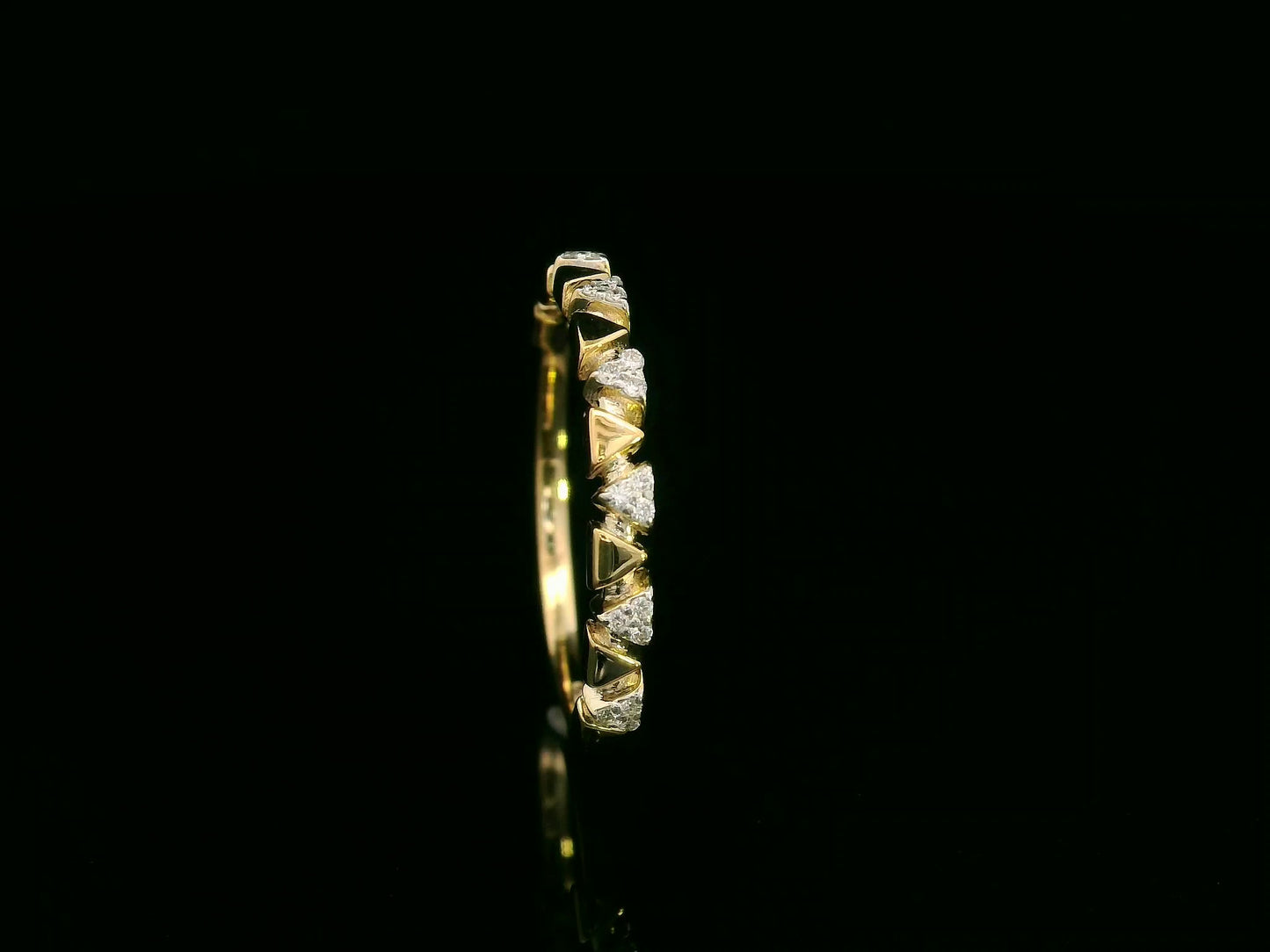 18K yellow gold diamond geometric band ring with triangle accents, 0.08 carat diamonds, modern stackable ring by Emirates Diamonds