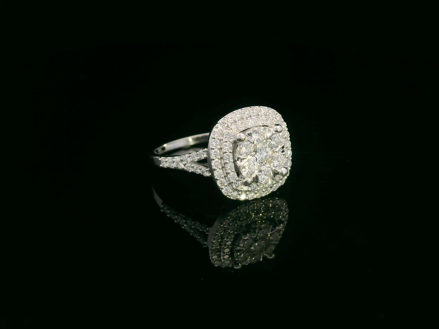 18K white gold double halo diamond engagement ring with pavé-set band, luxury fine jewelry by Emirates Diamonds.