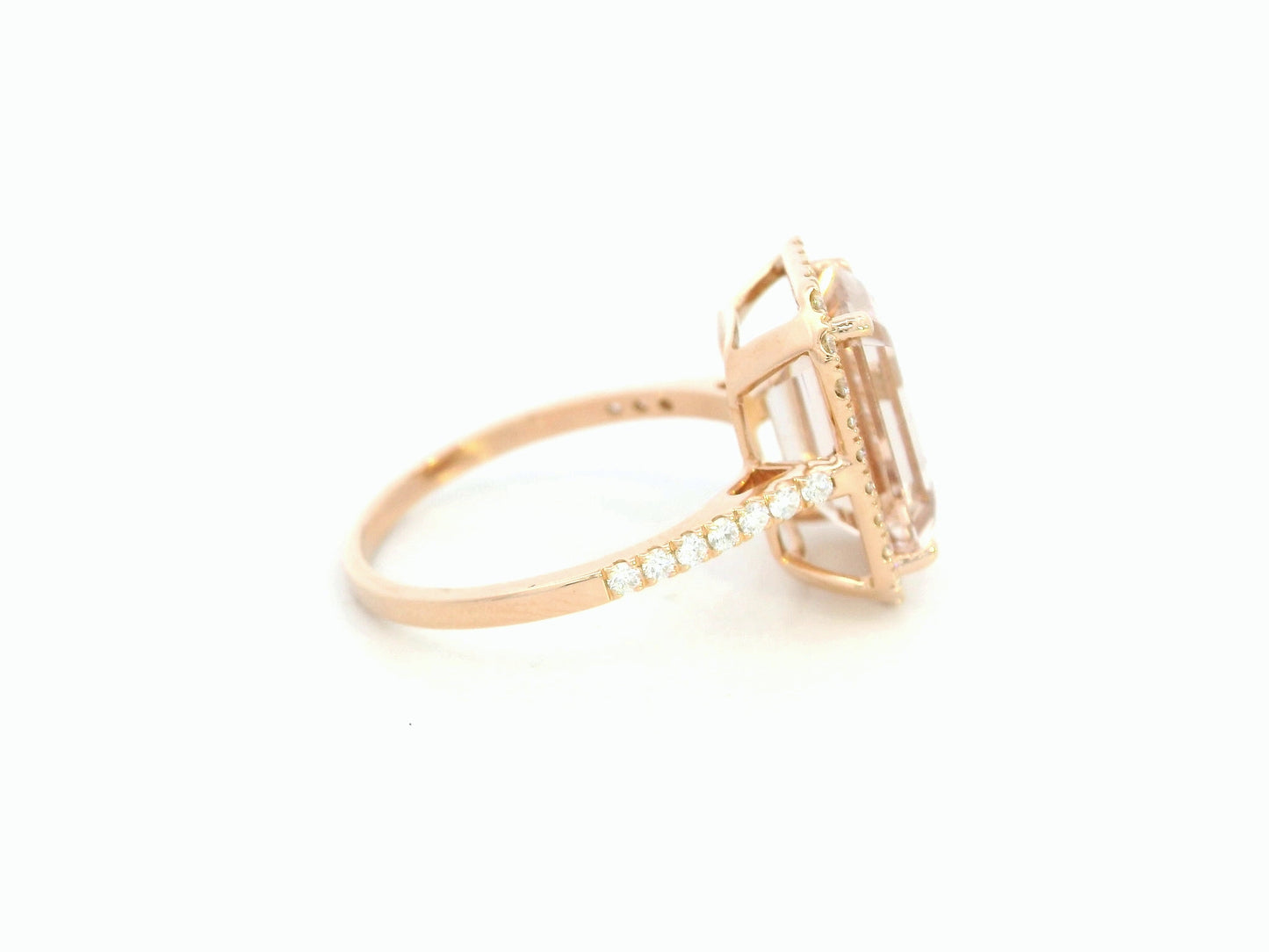 18K rose gold emerald-cut morganite ring with diamond halo and diamond band by Emirates Diamonds