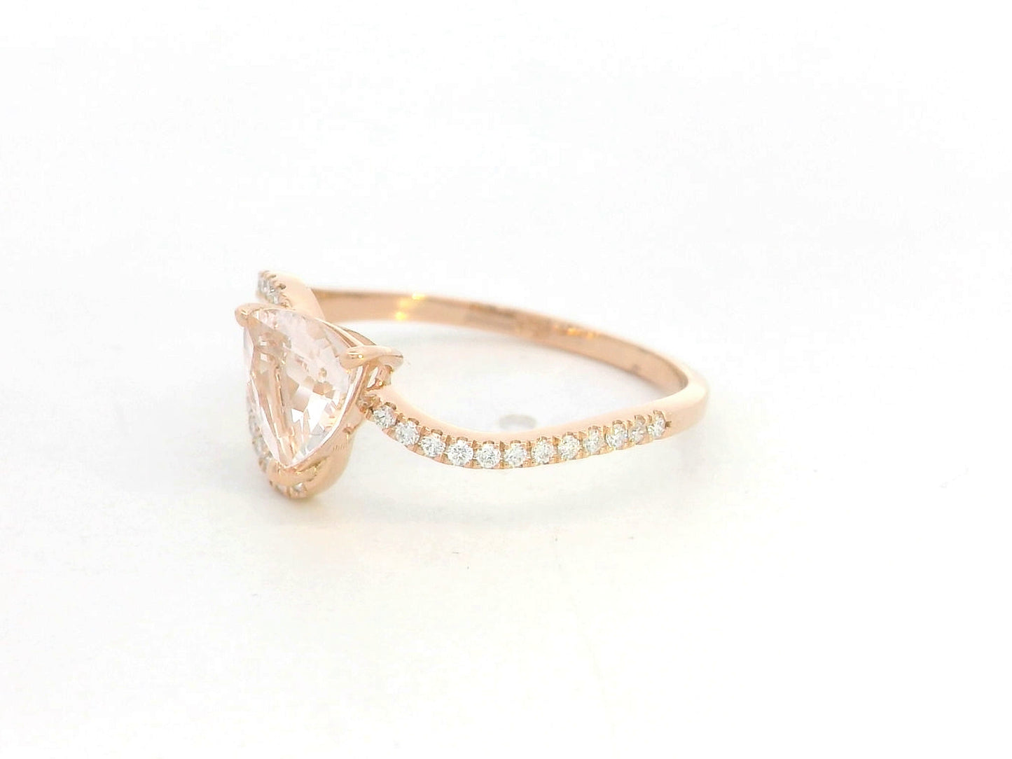 Morganite diamond twist ring in 18K rose gold with pavé band