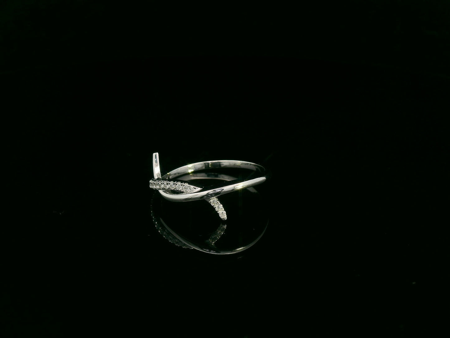 0.11 carat diamond crossover ring in 18K white gold by Emirates Diamonds