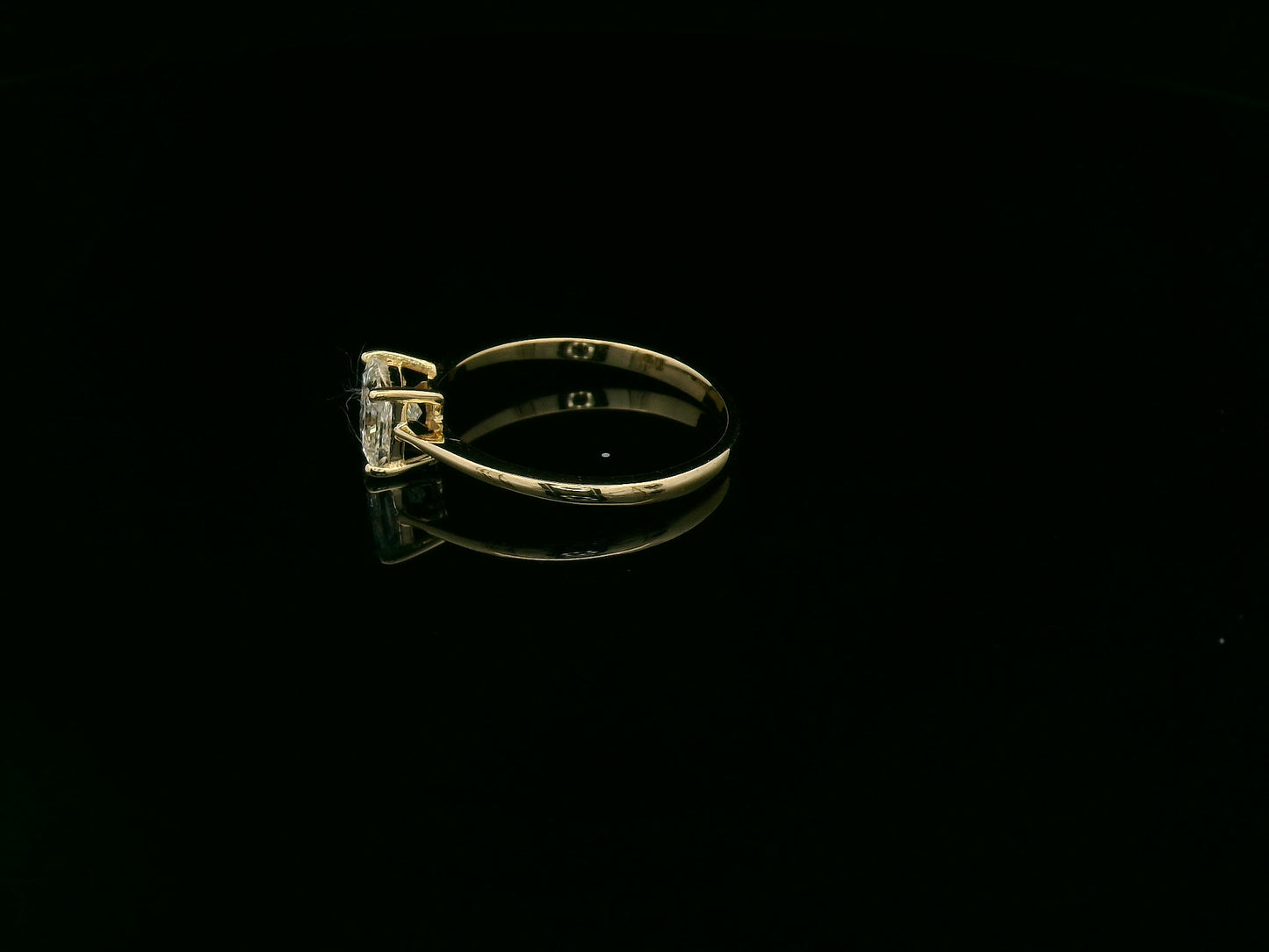 Princess cut diamond solitaire ring in 18K yellow gold by Emirates Diamonds