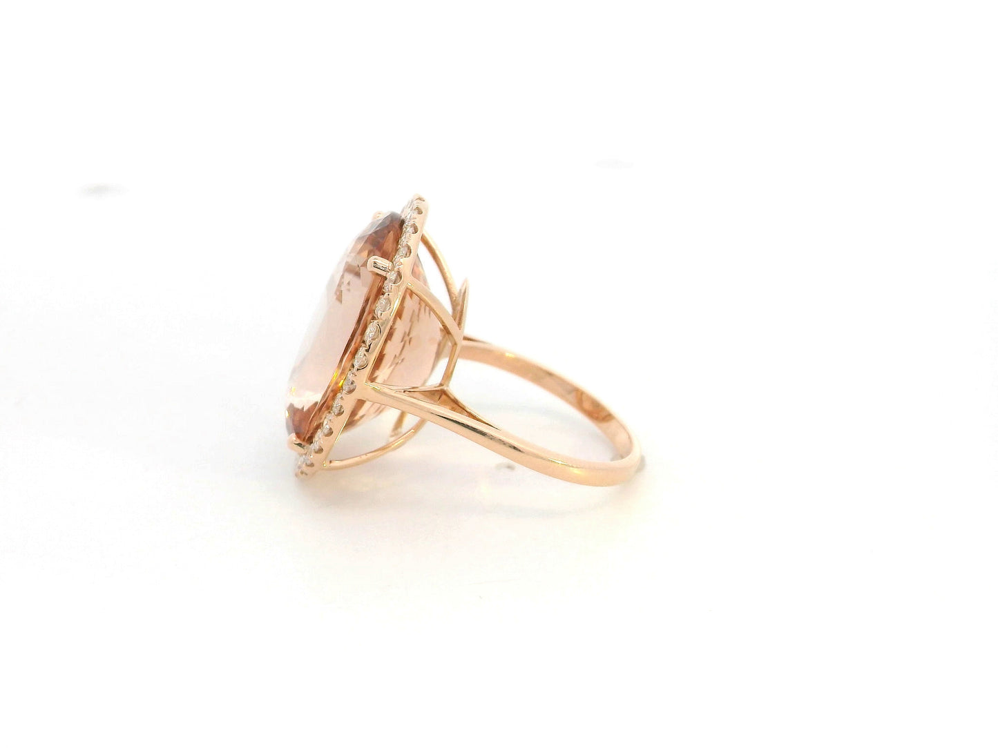 20.67 carat oval morganite diamond halo ring in 18K rose gold by Emirates Diamonds