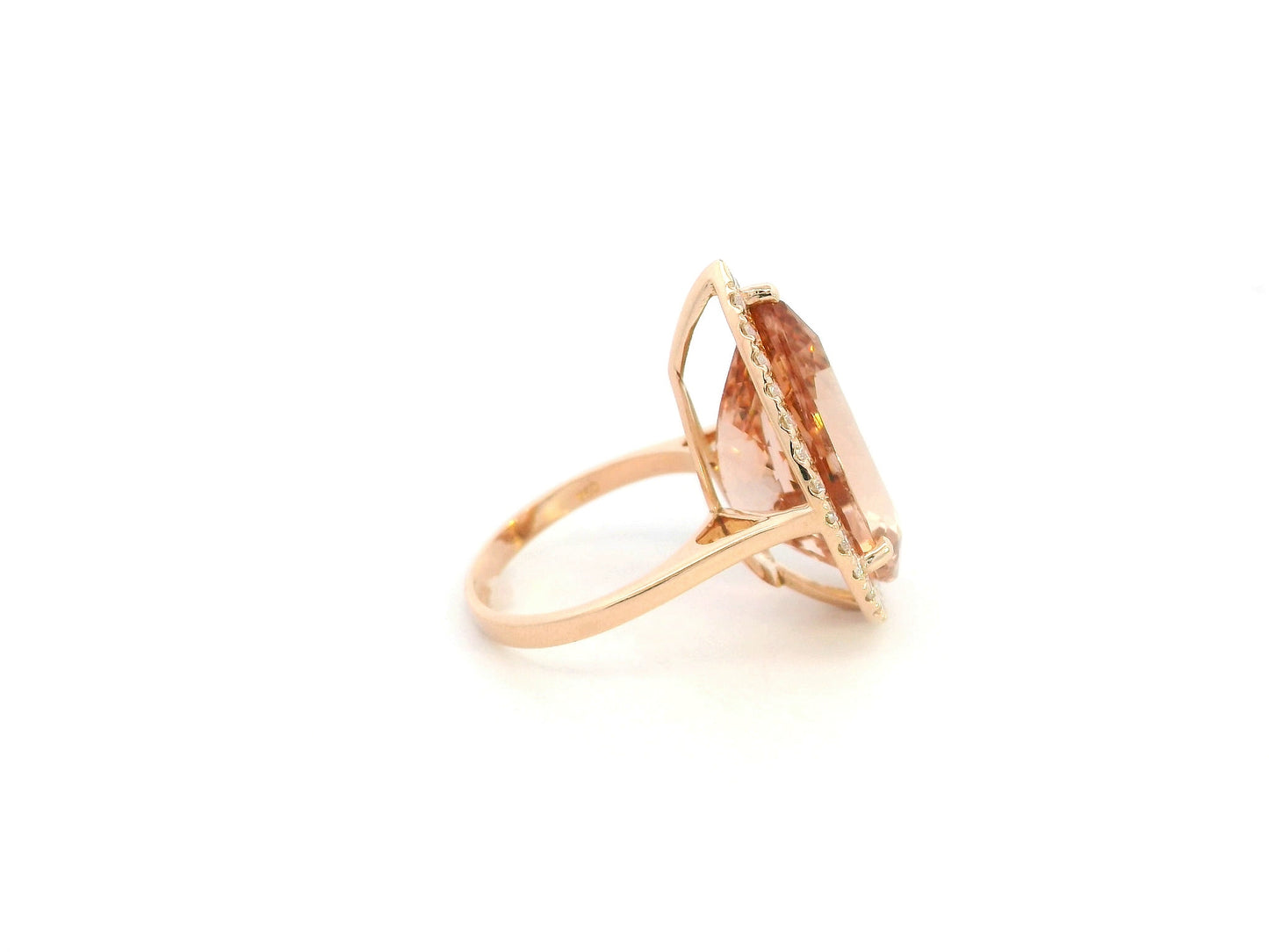 27.07 carat pear morganite and diamond halo statement ring in 18K rose gold by Emirates Diamonds Dubai