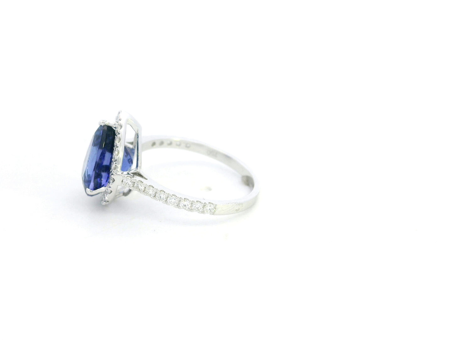 Pear cut tanzanite ring 3.83 carat with diamond halo in 18K white gold by Emirates Diamonds