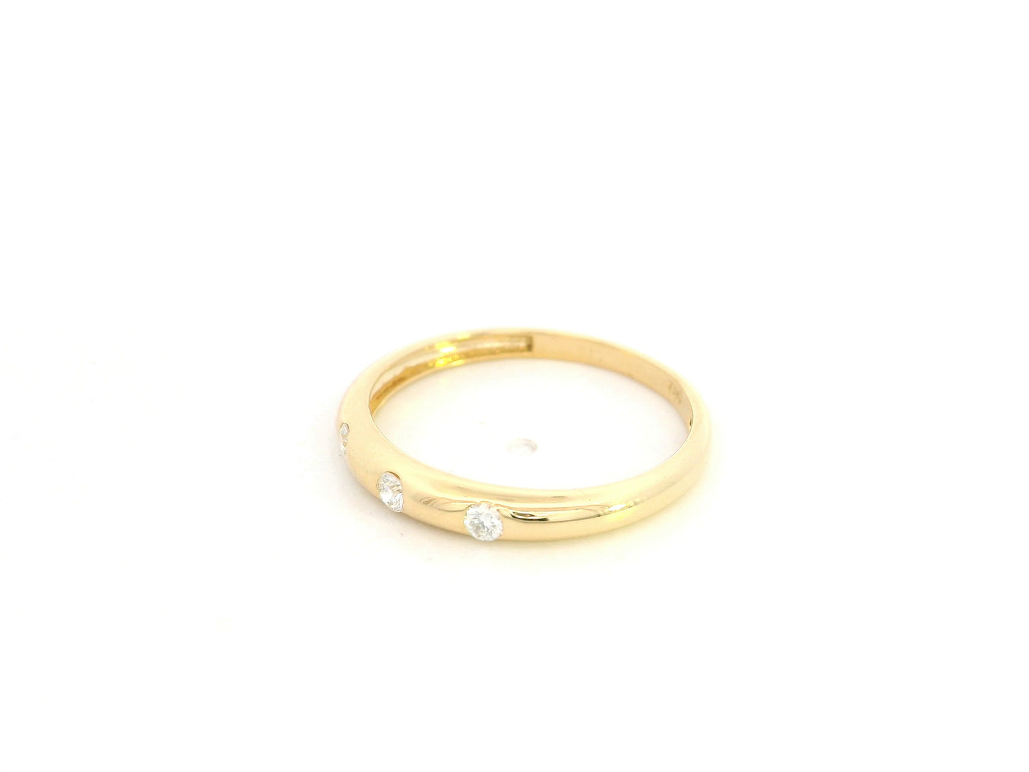 Minimal diamond band ring in 18K yellow gold with 0.13 carat diamonds