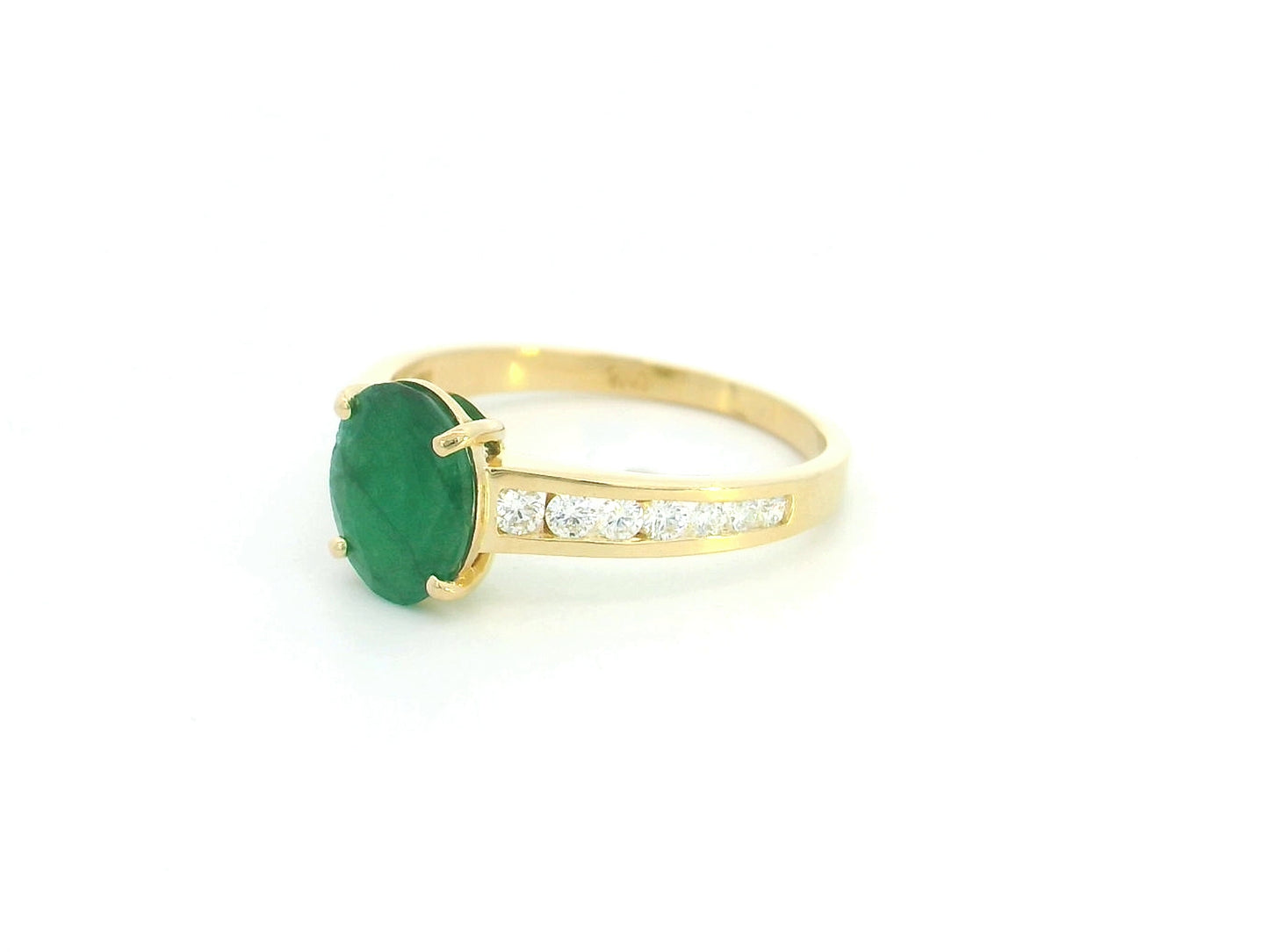 Oval emerald and diamond ring in 18K yellow gold by Emirates Diamonds