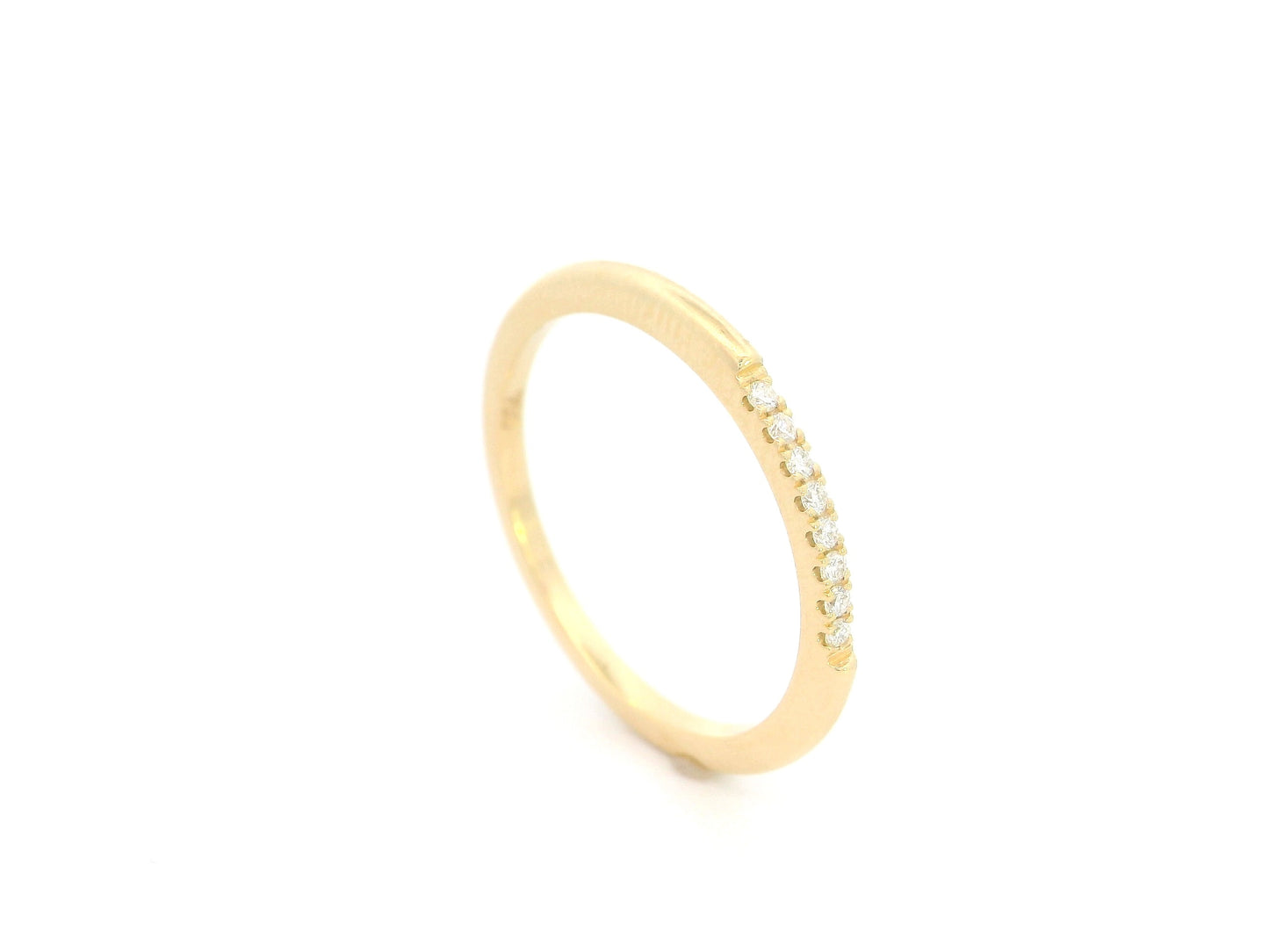 18K yellow gold slim diamond stacking ring featuring 0.06 carat natural diamonds in a minimalist band design