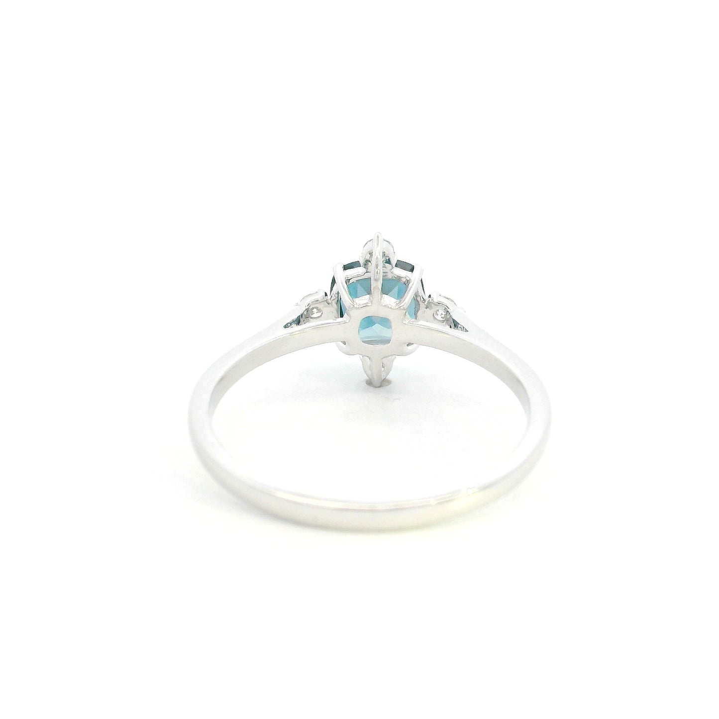 18K white gold London Blue Topaz ring featuring a 1.10 carat natural cushion-cut London Blue Topaz with 0.14 carat natural diamond accents.