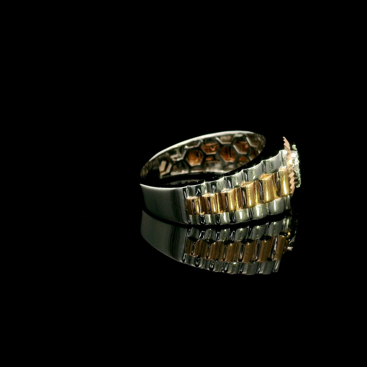Men’s diamond ring in 18K white and rose gold with circular diamond centre and two-tone wide band