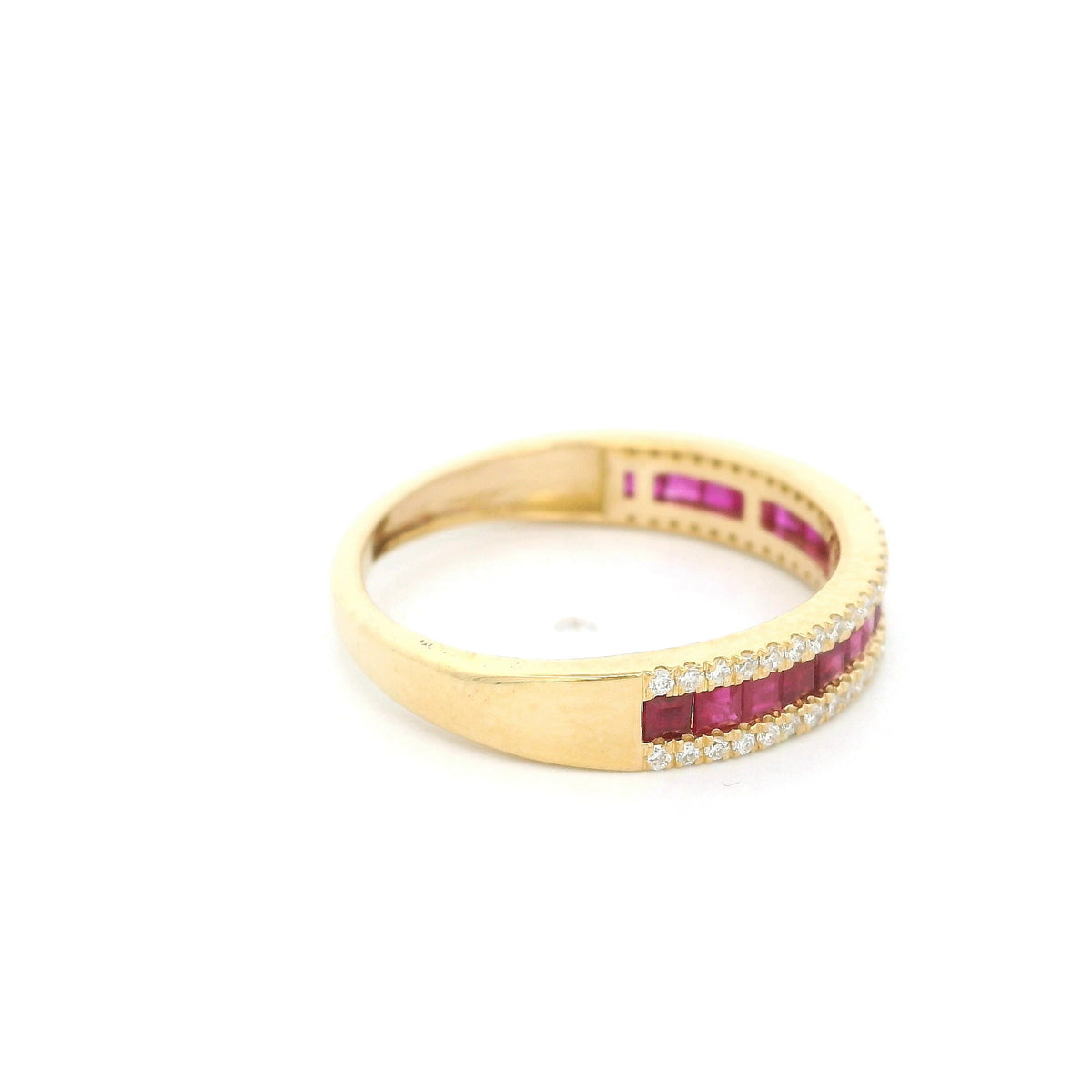 18K yellow gold band ring with a row of square-cut red rubies bordered above and below by small round diamonds.