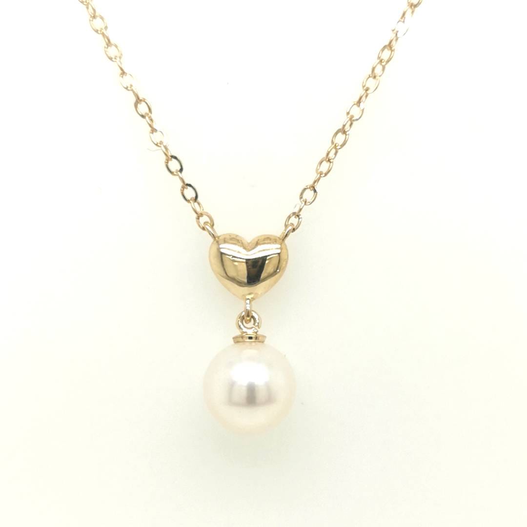 Fresh Water Pearl With A Heart Charm Pendant Necklace In 18k Yellow Gold.