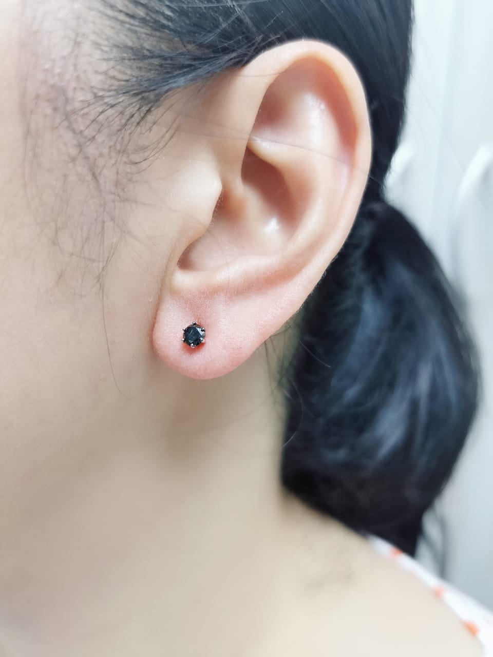 Introducing The Perfect Accessory To Take Your Look From "Meh" To "Meow"! These Black Diamond Stud earrings, Crafted In 18k White Gold, Can Be Styled On Your Lobe, Cartilage, Or Tragus — Talk About Versatile! Perfect For Adding A Subtle Hint Of Sparkle To Any Outfit!