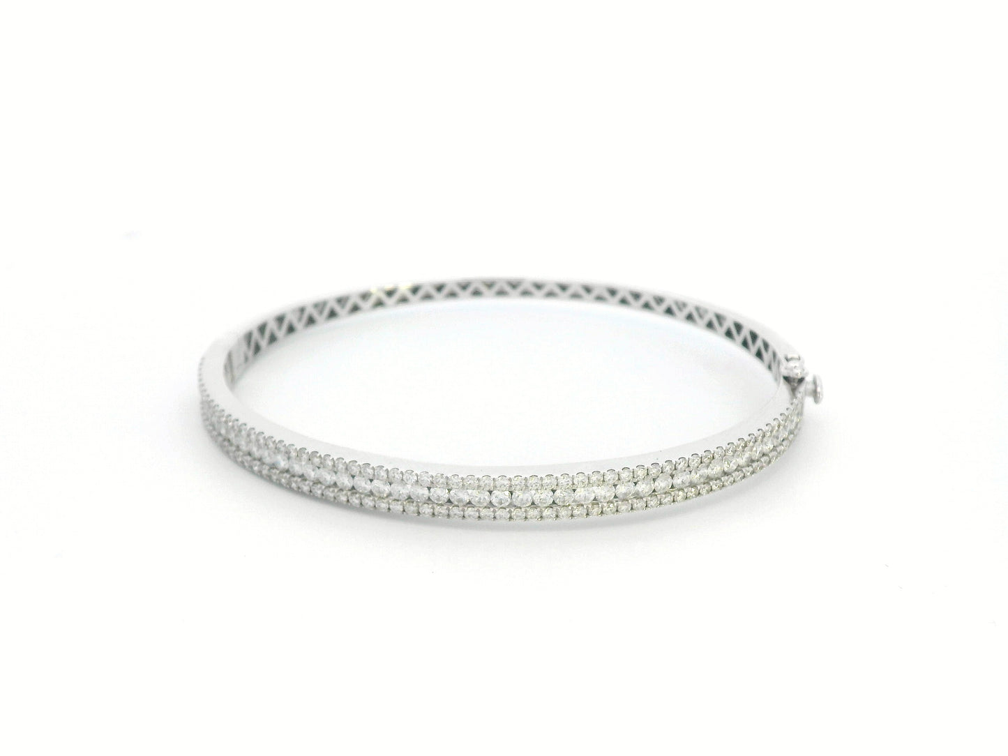 18K white gold bangle with triple row diamond setting featuring 2.36 carats of round diamonds and a secure clasp