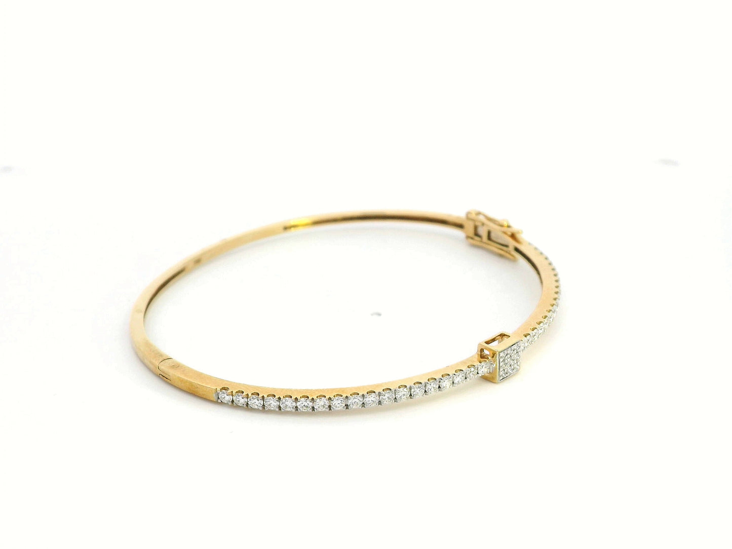 18K yellow gold diamond bangle bracelet with square diamond centerpiece and 0.92 carats of diamonds