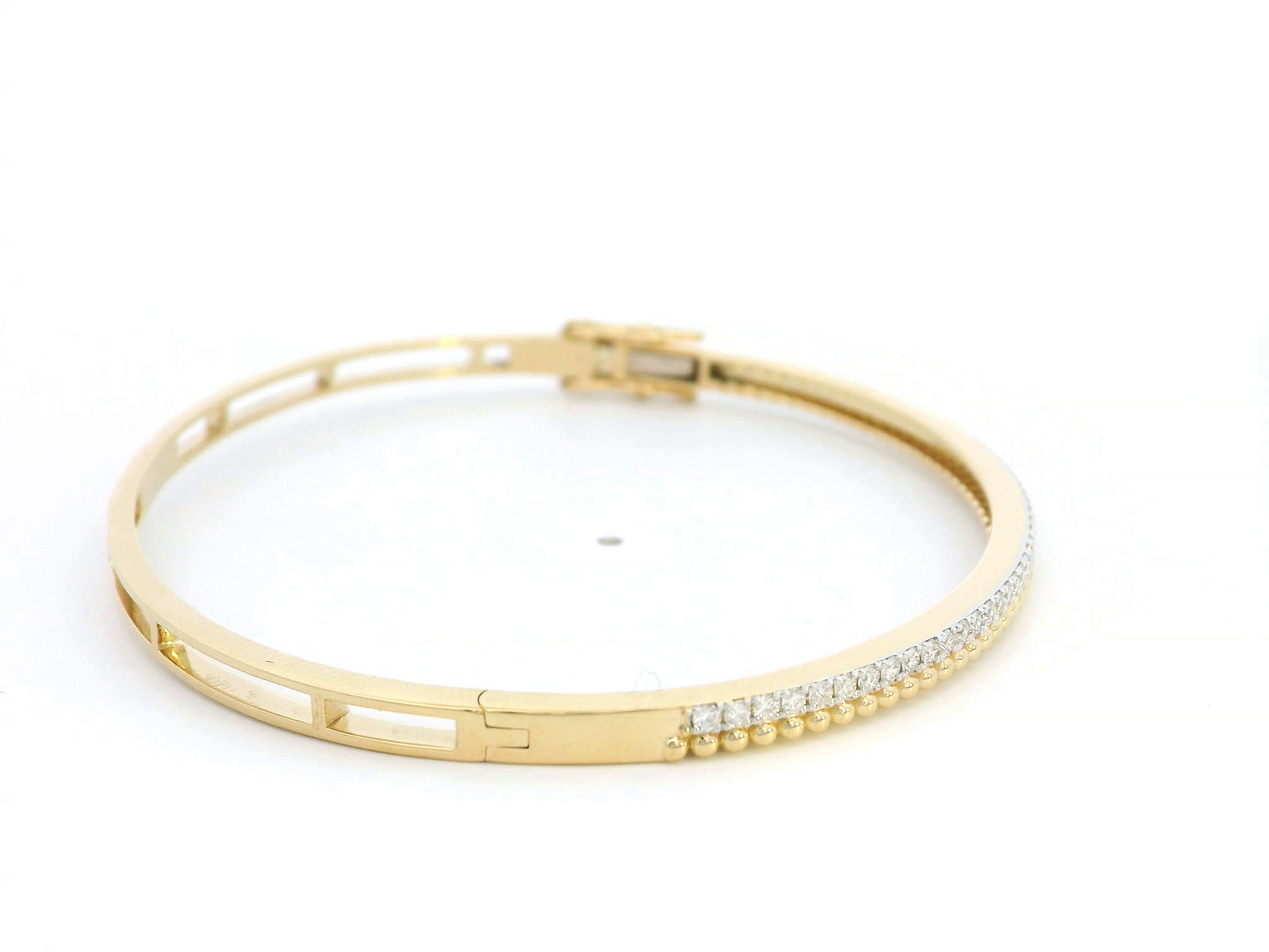 18K gold diamond bangle bracelet with beaded details and 0.57 carats of diamonds, featuring a sleek and elegant design.