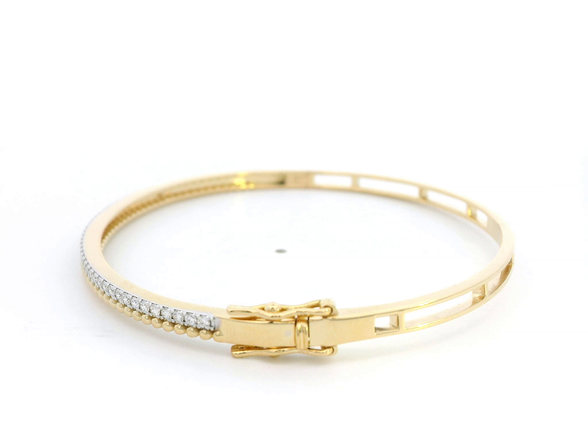 18K gold diamond bangle bracelet with beaded details and 0.57 carats of diamonds, featuring a sleek and elegant design.