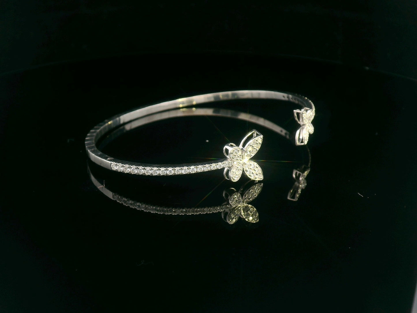 18K gold butterfly bangle with 0.86 carat pavé diamonds in open cuff design