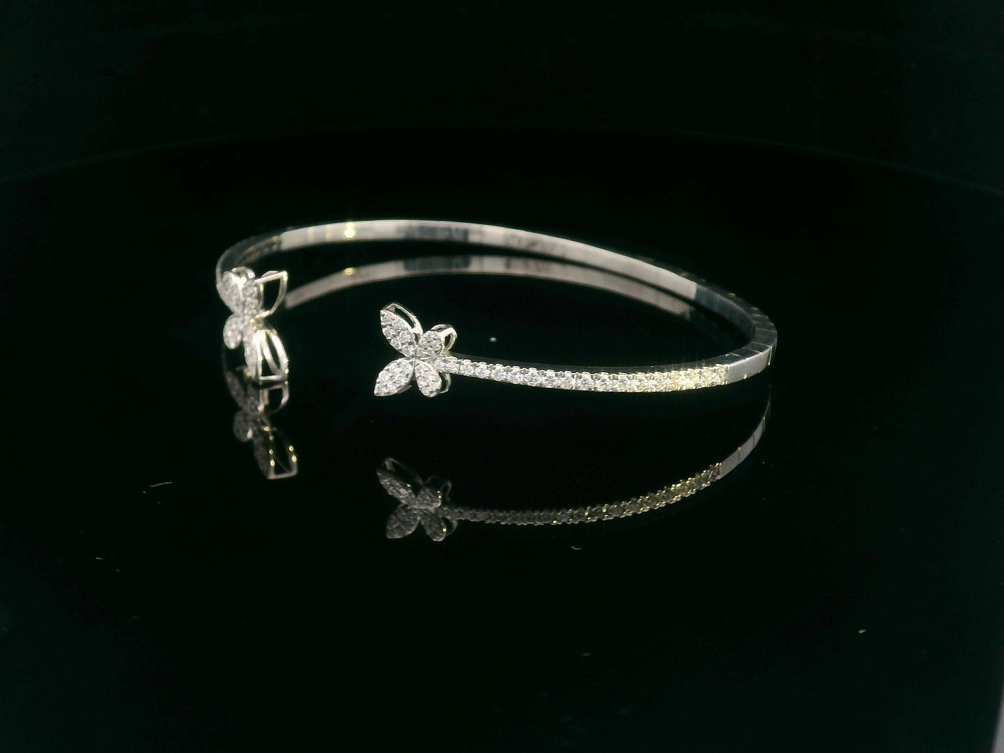 18K gold butterfly bangle with 0.86 carat pavé diamonds in open cuff design