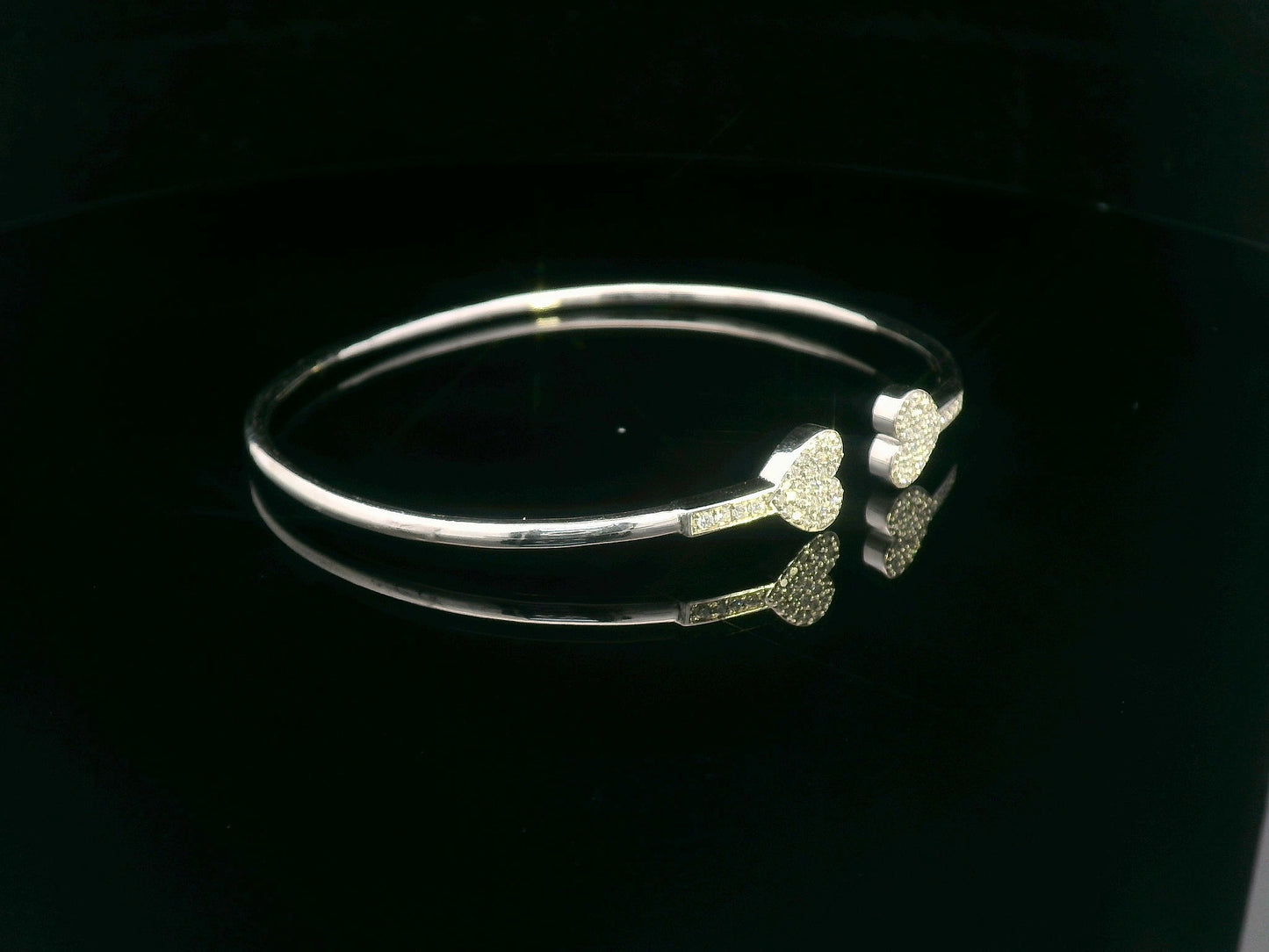 18K gold open bangle with pavé diamond heart ends – minimalist romantic bracelet