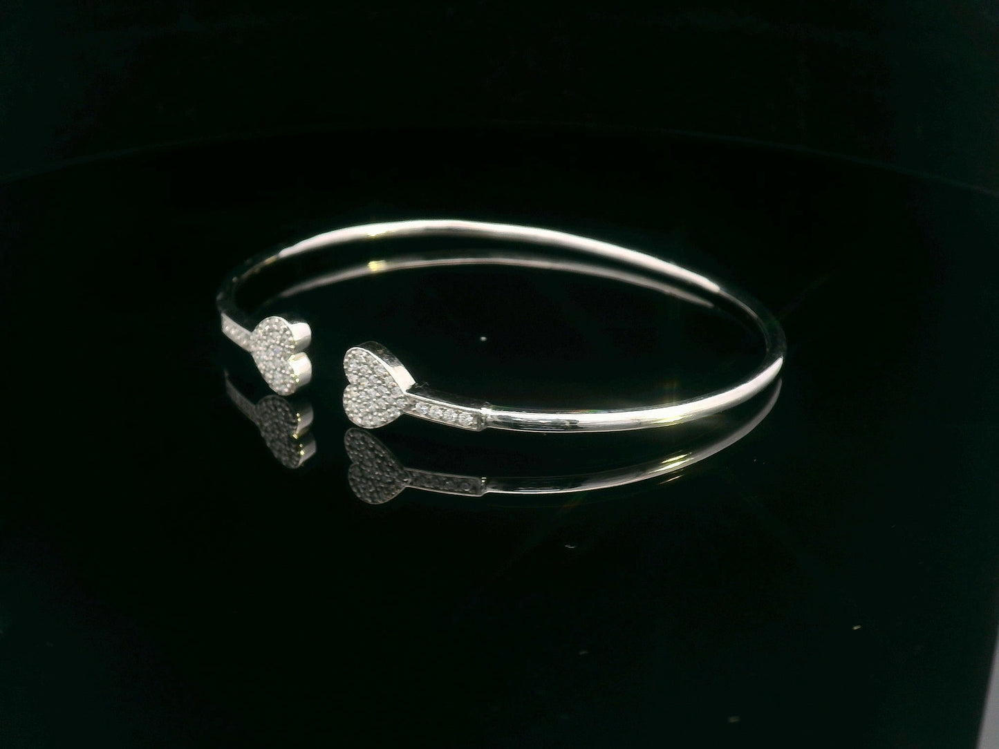 18K gold open bangle with pavé diamond heart ends – minimalist romantic bracelet