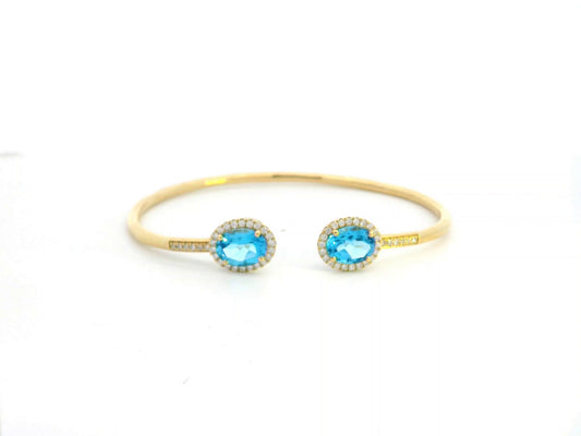18K Yellow Gold Swiss Blue Topaz & Diamond Bangle with Oval-Cut Gemstones and Halo Diamonds – Elegant Open Cuff Bracelet.