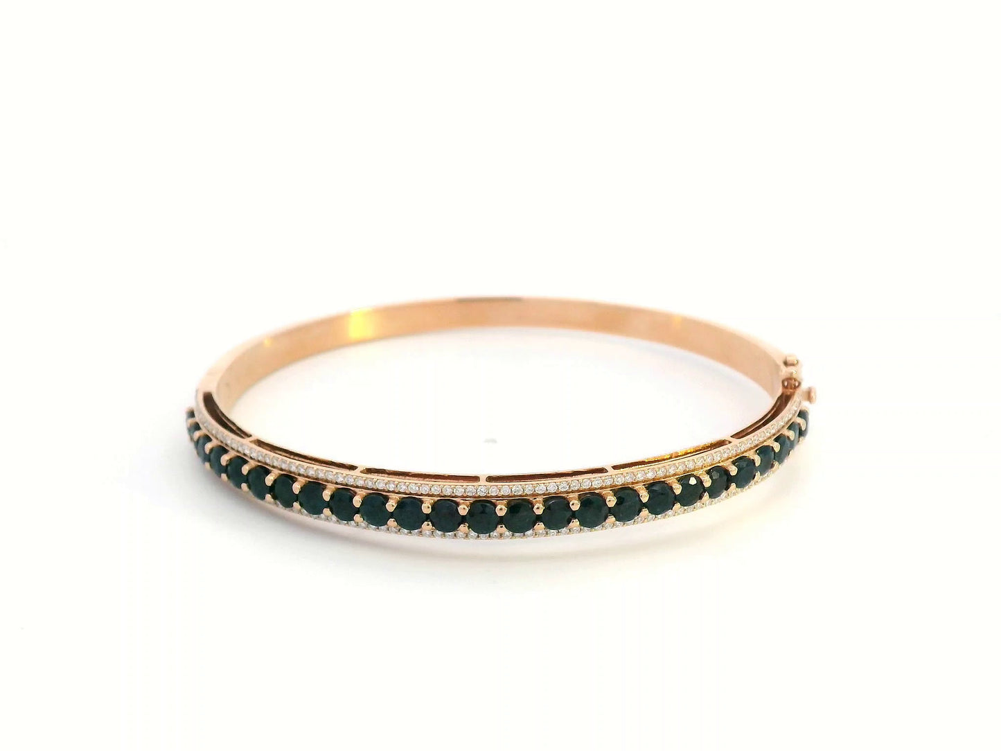 18K rose gold bangle with blue sapphires and diamond accents, luxury gemstone bracelet