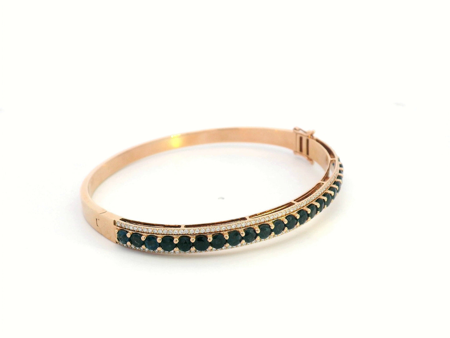 18K rose gold bangle with blue sapphires and diamond accents, luxury gemstone bracelet