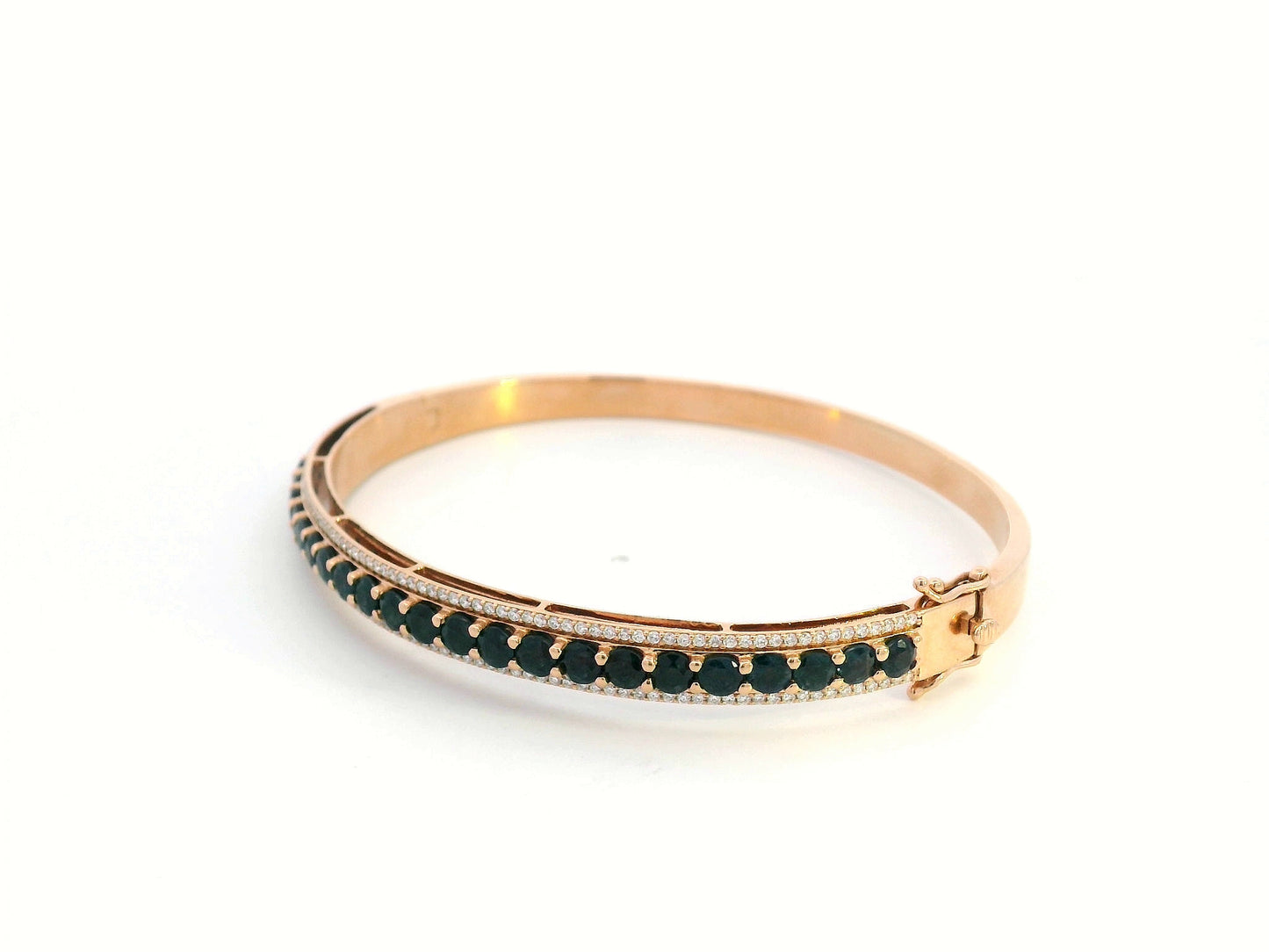 18K rose gold bangle with blue sapphires and diamond accents, luxury gemstone bracelet