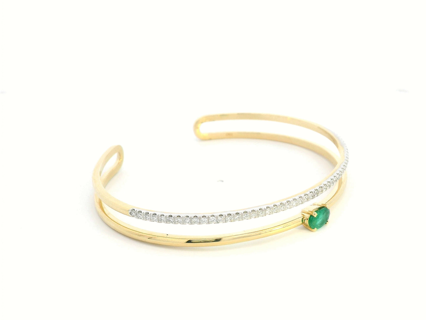 18K yellow gold open bangle with oval emerald and diamond band – 0.48ct emerald and 0.59ct diamond